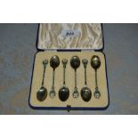 Cased set of six Birmingham silver and enamel decorated coffee spoons with floral design handles