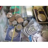 Tin containing a collection of various World coins and crowns