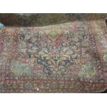 Tabriz rug with all-over medallion and floral design with multiple borders on a blue ground,