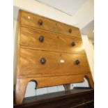 19th Century mahogany chest of three long drawers having knob handles and shaped bracket feet