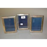 Three silver rectangular photograph frames, 6.25ins x 4.