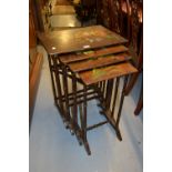 Nest of four rectangular occasional tables painted with flowers and birds,