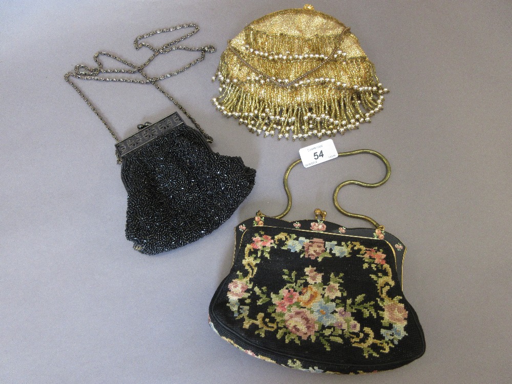 Beadwork evening purse on chain together with two other evening purses