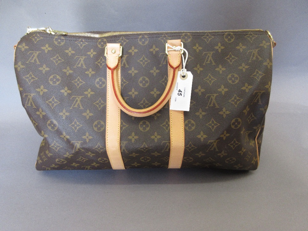 Louis Vuitton light brown leather and monogrammed holdall type bag