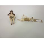 Two small Art Deco bisque piano dolls