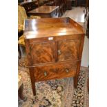 George III mahogany tray-top commode with two doors above a pull-out base (some damages)