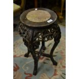 Chinese circular rosewood marble inset jardiniere stand with carved and pierced bamboo decoration,