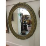 Large 19th Century oval gilded composition wall mirror,