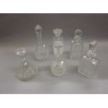 Six various glass decanters with stoppers