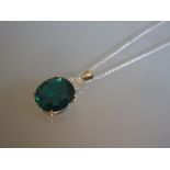 18ct White gold simulated emerald and diamond pendant