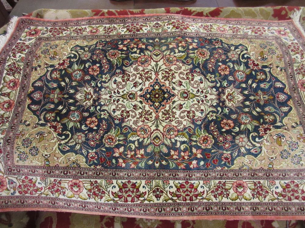 Small Turkish part silk rug with centre medallion,
