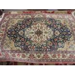 Small Turkish part silk rug with centre medallion,