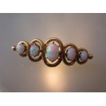 15ct Gold bar brooch set five graduated opals