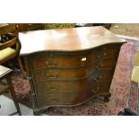 Early 20th Century mahogany serpentine shaped chest,