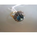 18ct Yellow gold circular blue zircon and diamond cluster ring