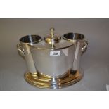 Silver plated two bottle wine cooler with central ice compartment