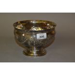 George IV silver pedestal bowl embossed with flowers and swags, London, 1821, makers mark I.S.