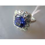 18ct White gold large tanzanite and diamond cluster ring, the tanzanite approximately 4ct,