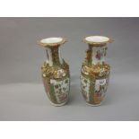 Pair of 19th Century Canton baluster form vases (at fault)