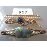 15ct Gold bar brooch set sapphire and four diamonds together with an opal and pearl bar brooch and
