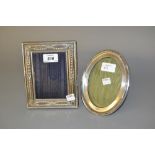 London Britannia silver mounted rectangular photograph frame together with an oval Birmingham