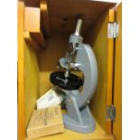 Student's Chinese microscope in original fitted case with small amount of accessories