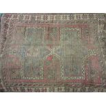 Kurdish rug with red and blue ground (frayed and very worn),