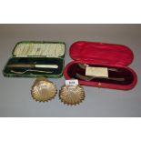 Pair of Sheffield silver shell form salts together with two silver part Christening sets in cases