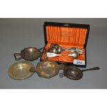 Three silver tea strainers,