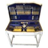 Part canteen of silver plated Old English pattern cutlery in a later painted oak case