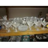 Waterford extensive suite of drinking glasses together with ice cream plates