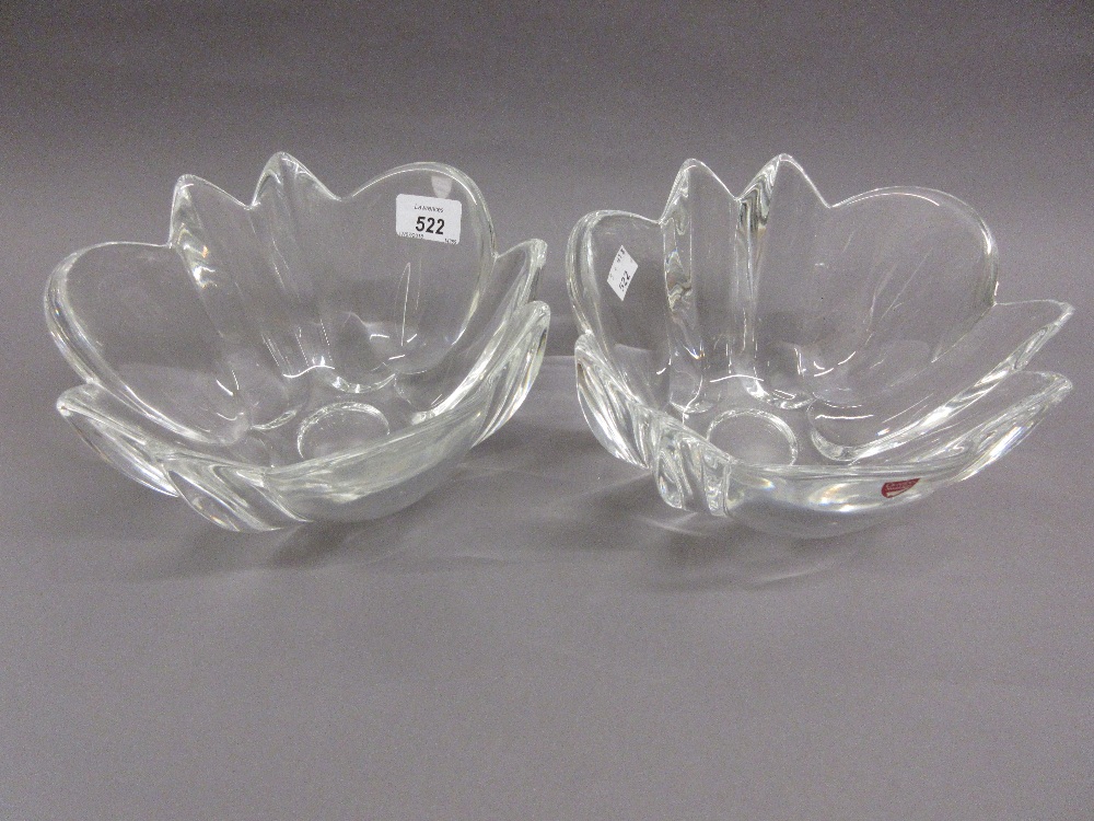 Pair of Orrefors clear glass fruit bowls of foliate design,