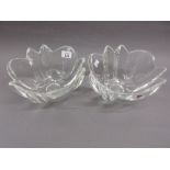 Pair of Orrefors clear glass fruit bowls of foliate design,
