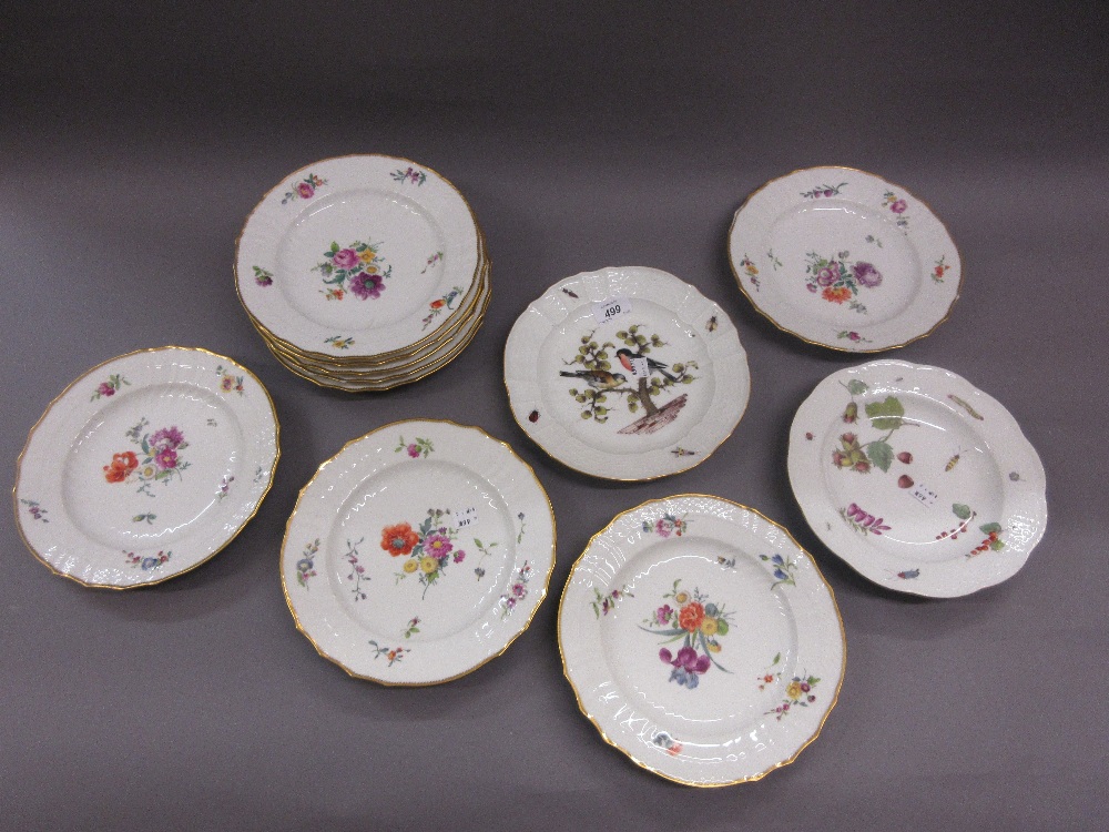 Group of nine Copenhagen porcelain plates painted with floral sprigs within moulded basket weave