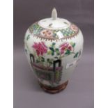 Chinese famille rose large baluster form vase painted with vases of flowers and Chinese character