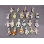 Box containing a collection of twenty two various large porcelain half dolls