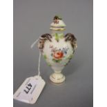 German Volkstedt porcelain perfume bottle with rams head side handles and floral decorated stopper