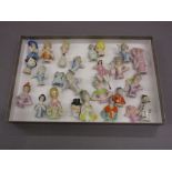 Box containing a collection of twenty five various porcelain half dolls