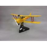 Painted wooden model of a Tiger Moth aeroplane