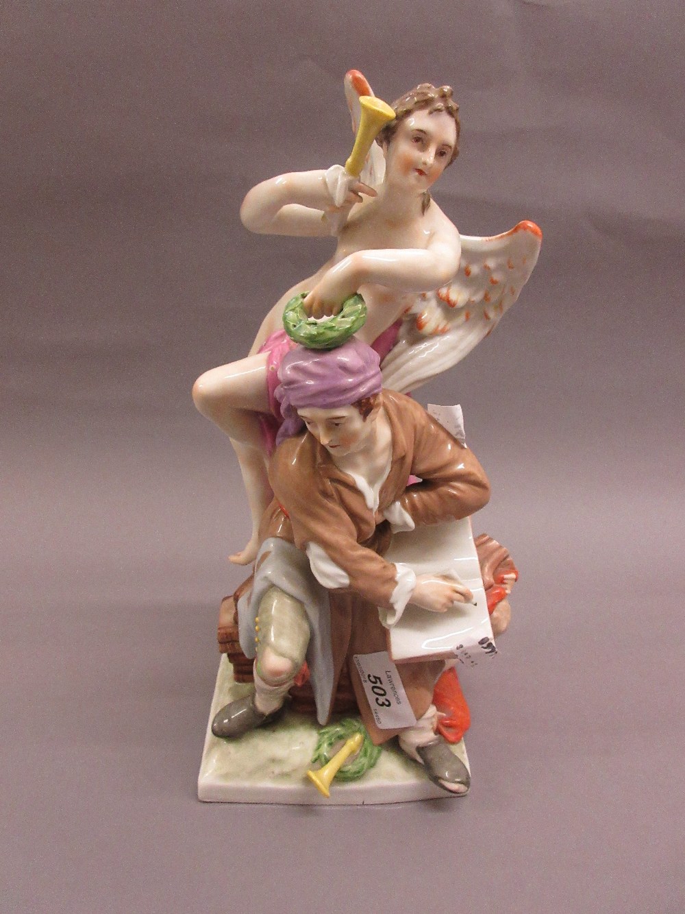 Late 19th Century Berlin porcelain group of a seated figure accompanied by an angel (various