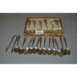 Set of twelve Mappin & Webb silver coffee spoons with matching sugar tongs,