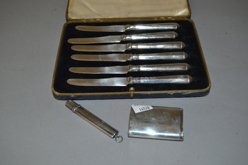 Cased set of six silver handled tea knives,