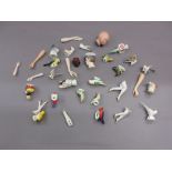 Box containing a collection of animal and bird pincushion figures,
