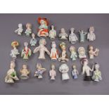 Box containing a collection of twenty five various porcelain half dolls