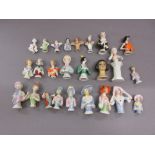 Box containing a collection of twenty five various porcelain half dolls