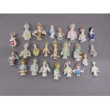 Box containing a collection of twenty five various porcelain half dolls