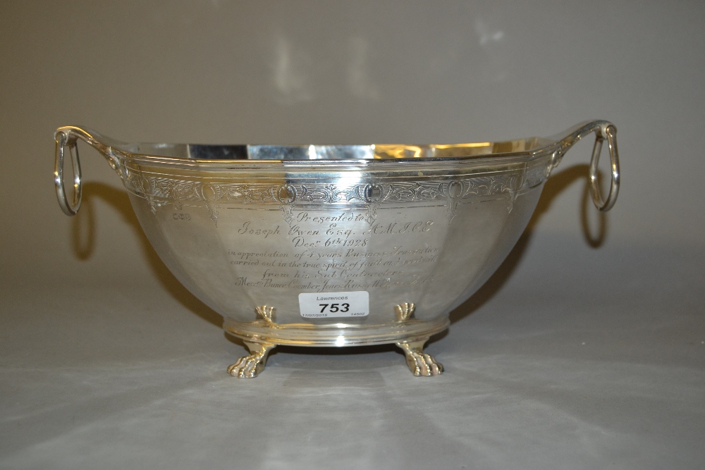 Oval silver presentation jardiniere, raised on four claw supports, Sheffield,
