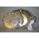 Two modern oval plated two handled trays (one at fault),