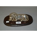 Silver covered resin figure of a lion, marked Afri silver, makers mark D.G.