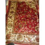 Red ground Kashan pattern machine carpet, 2.3m x 1.